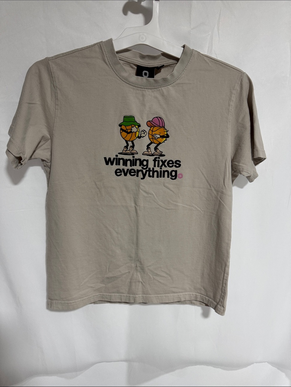 Overtime Tan/ Beige Graphic Tee Shirt - “Winning Fixes Everything” Youth L